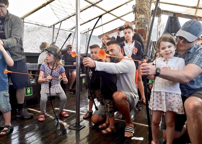 Arrow shooting game on board viking boat excrusion Tenerife.jpg