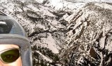 paragliding over mountains in Tenerife