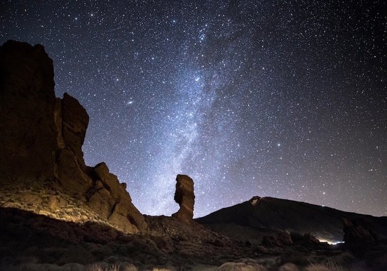 Roques de Garcia and starry night on Teide.jpg