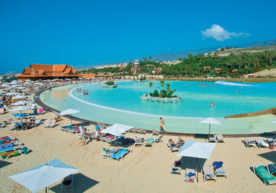 relax at the white sand beach in Siam Park