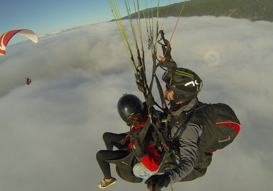 see clouds below your feet via paragliding in Tenerife